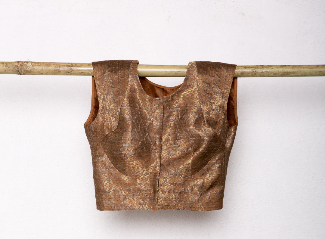 Calantha's Sleeveless Brocade Blouse